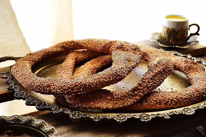 Sesame koulouri rings on a tray with Greek coffee, a popular breakfast on the Taste of Athens food tour