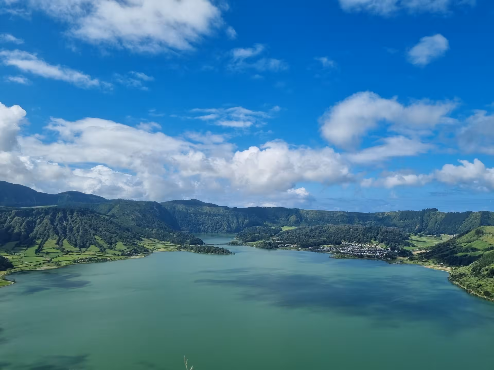 Panoramic view of Sete Cidades lagoon and crater on São Miguel, Azores scenic stop on buggy tour