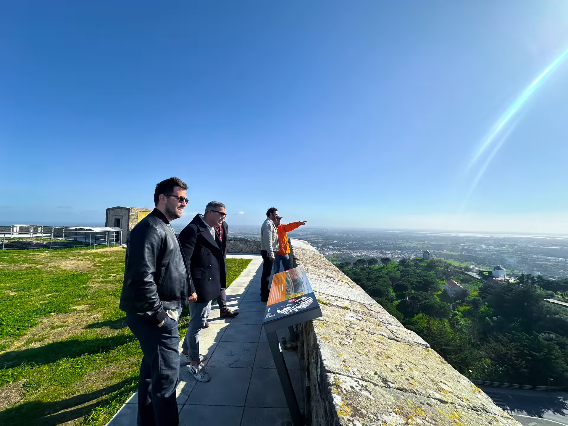 Tour group enjoying panoramic views of Setúbal from a historic vantage point on the Blue Coast tour.