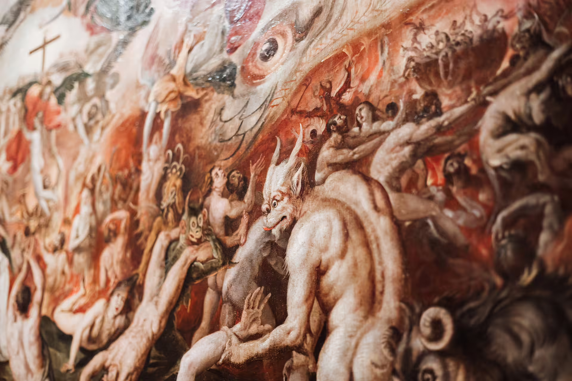 Detailed painting of mythological creatures and figures at Seville's Fine Arts Museum, showcasing vibrant Renaissance art.