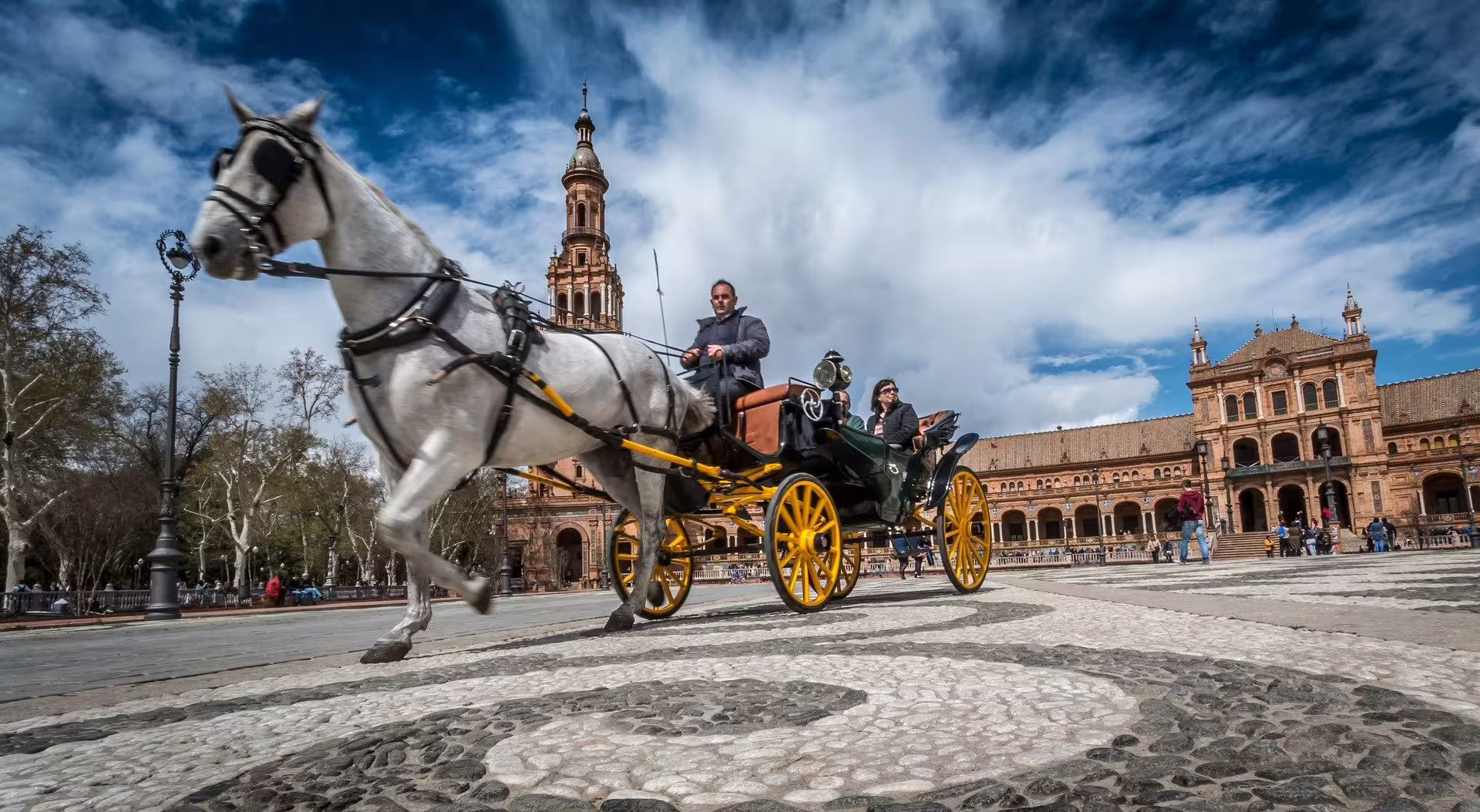 Horse-drawn carriage at Plaza de España on a Seville private day trip from Costa del Sol with driver