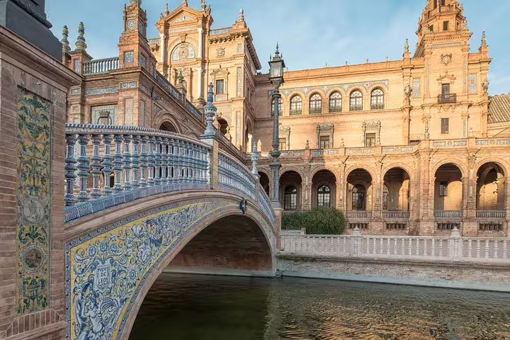 Beautiful view of Seville's Plaza de España showcasing ornate architecture, perfect for Alcazar skip-the-line tour from Cadiz Port.