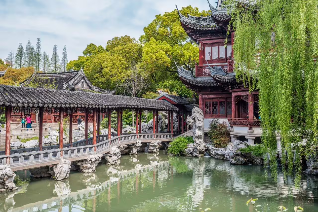 Explore traditional Chinese architecture and serene gardens in Shanghai's historic Yu Garden on a private city tour.