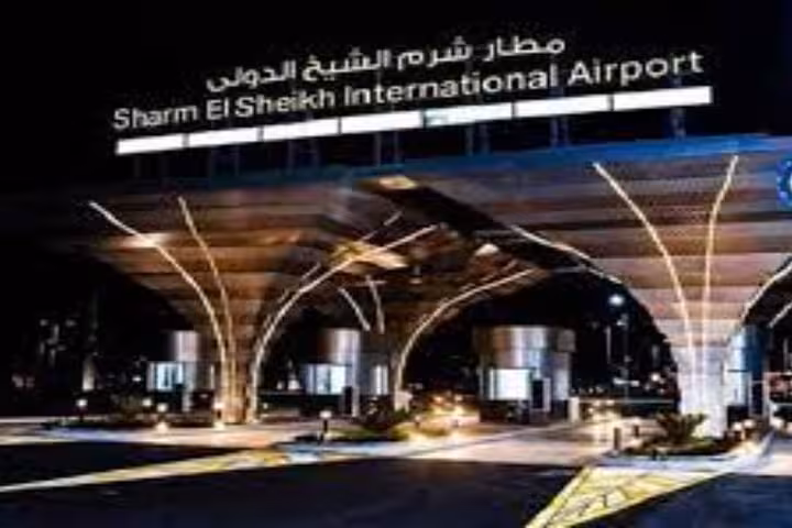 Sharm El Sheikh International Airport entrance at night, meeting point for private airport transfer pickup and drop-off