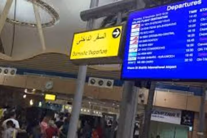 Sharm El Sheikh Airport departures hall with flight board, ideal for private pickup or drop-off transfer service