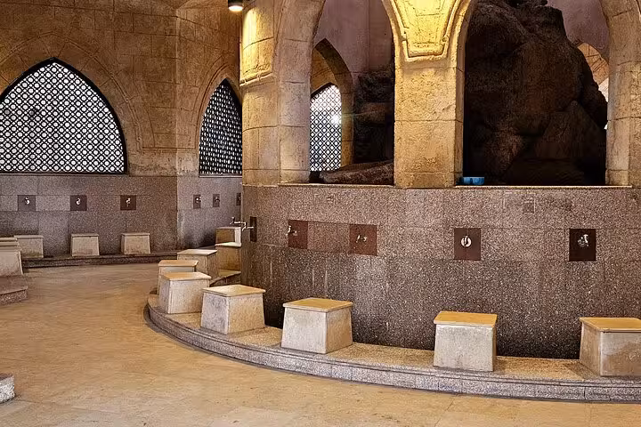 Stone seating and arched interior at Sharm El-Sheikh Old Market mosque, private tour experience