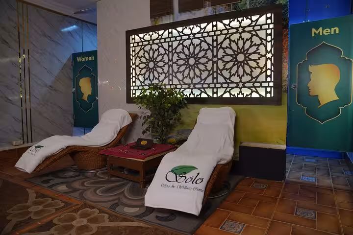 Sharm El Sheikh spa lounge with recliners and separate men and women areas before a Swedish massage session