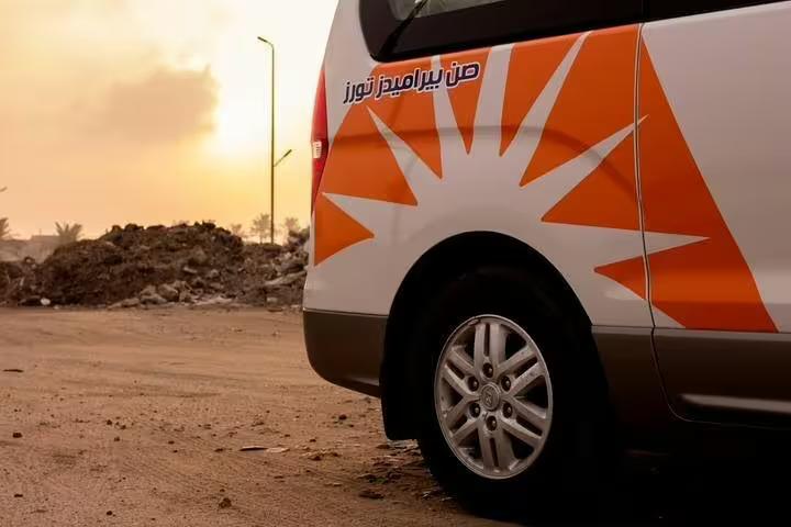 Branded private transfer van at sunset for Sharm El Sheikh to Taba ride, comfortable Egypt door-to-door
