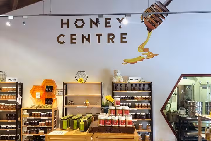 Honey Centre interior with shelves of honey products featured on the Sheep World Country Tour from Auckland.