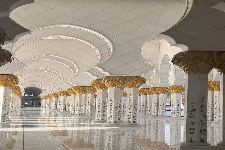 Sheikh Zayed Grand Mosque colonnade, a highlight on Abu Dhabi layover sightseeing tour with transfers
