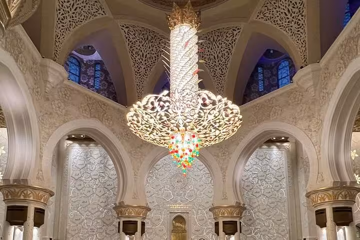 Sheikh Zayed Grand Mosque chandelier and ornate arches, highlight of Abu Dhabi layover tour with transfers