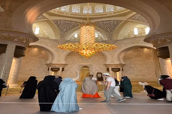 Sheikh Zayed Grand Mosque interior chandelier and arches on Dubai to Abu Dhabi multi day tour