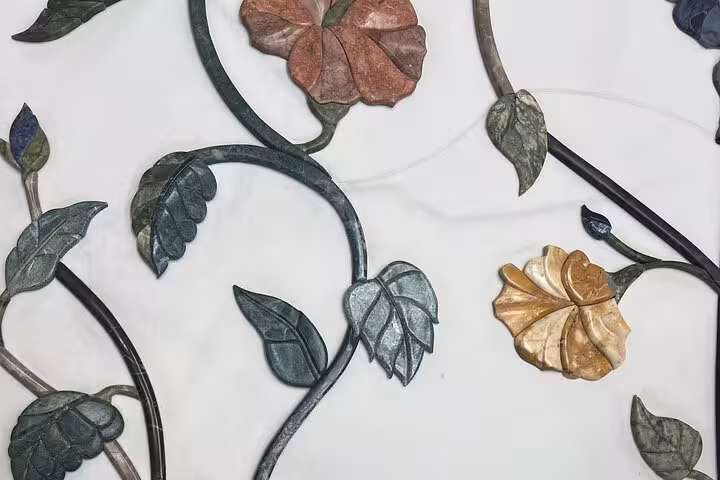 Floral marble inlay detail at Sheikh Zayed Grand Mosque, Abu Dhabi city tour highlight with Qasr Al Watan entry