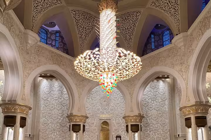 Sheikh Zayed Grand Mosque interior chandelier and ornate marble arches, Abu Dhabi sunset tour option