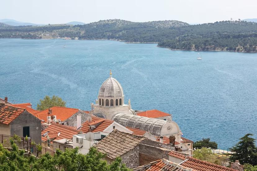 View over Šibenik rooftops and cathedral dome by the Adriatic Sea, scenic stop on Discover Šibenik from Zadar