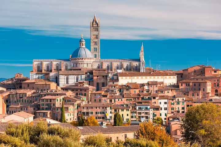 Stunning skyline of Siena with the historic cathedral and charming Tuscan buildings.