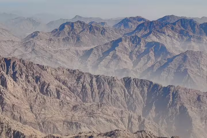 Panoramic view of rugged Sinai mountain ranges near Mount Moses, scenic stop on St Catherine tour from Taba