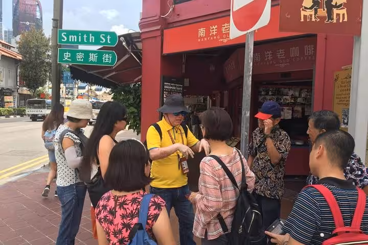 Tour group exploring Chinatown near Smith Street during the Singapore Signature Guided Tour with Free eSIM.