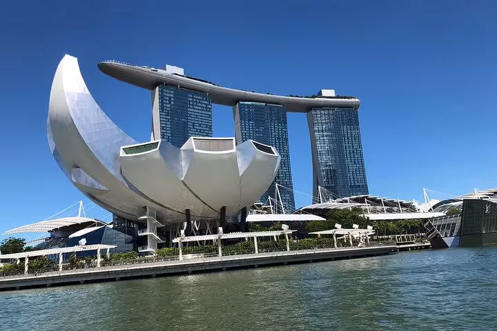 Marvel at the futuristic ArtScience Museum and Marina Bay Sands during the Singapore Night Extravaganza Cruise.