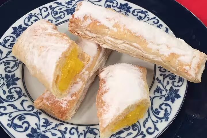 Enjoy traditional Portuguese pastries with a unique Sintra food tour, featuring delicious sweets and wine tasting.