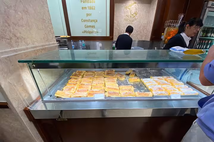 Traditional Sintra pastry shop display with local sweets, a tasty stop on the tuk tuk tour to Cascais