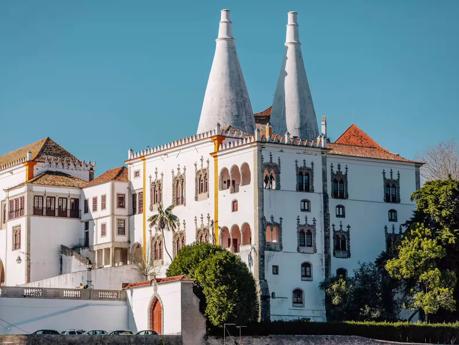 Explore the stunning architecture of Sintra's National Palace on a half-day guided tour with tickets included, featuring Pena Palace.