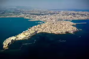 Drone panorama of Siracusa and Ortigia peninsula with turquoise sea, Sicily highlights on HD Best of Siracusa tour