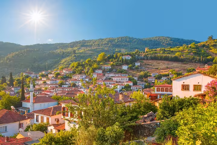 Panoramic Sirince Village hillside with red-tiled houses and vineyards, private Ephesus tour day trip
