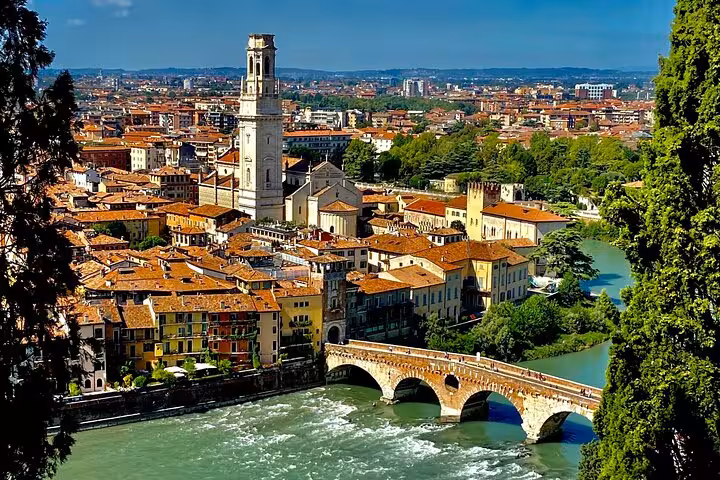 Stunning aerial view of Sirmione’s historic architecture and river, a must-see on a private day trip from Venice.