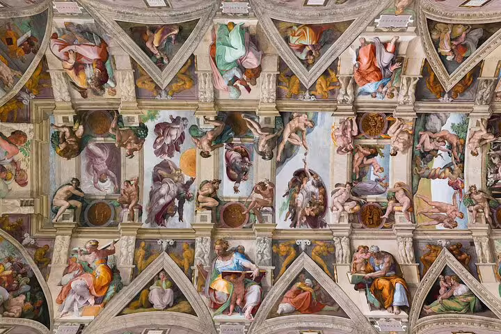 Michelangelo’s frescoed ceiling of the Sistine Chapel, visited on a fast track Vatican Museums and Rome in one day tour
