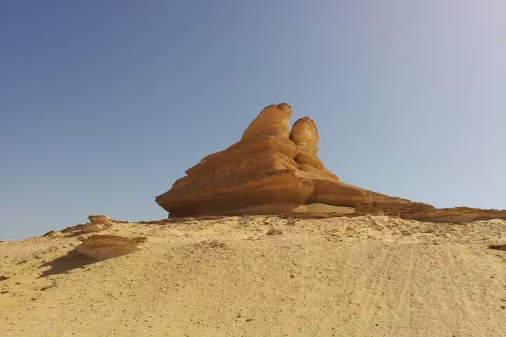 Wind-carved rock formation in the Siwa desert, Egypt, featured on a 4-day private Siwa Oasis tour from Cairo