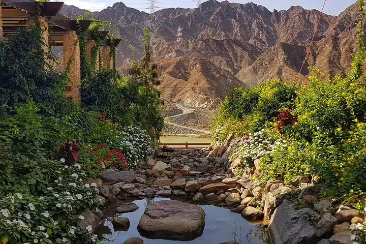 Discover the lush mountain oasis surrounded by rugged hills on the Full-Day Six Emirates Tour in a 4x4 from Dubai.