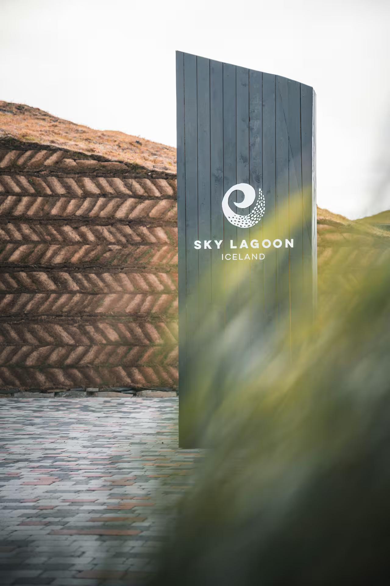 Entrance to Sky Lagoon Iceland, featuring modern design and natural surroundings, ideal for the Cold & Hot Snorkeling tour.