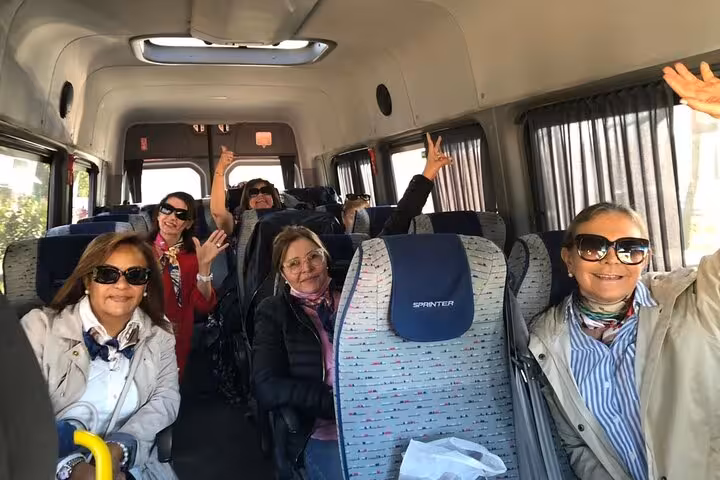 Happy travelers in a minibus on a small group Ephesus and House of Mary tour with lunch included