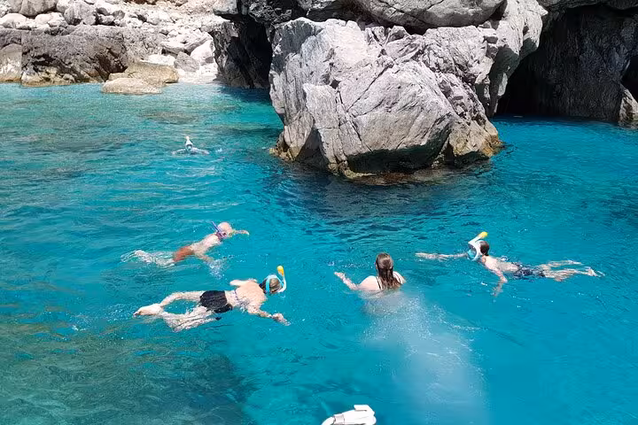 Snorkeling adventure in crystal clear waters near Capri on a private tour from Sorrento with Gozzo Apreamare 10.