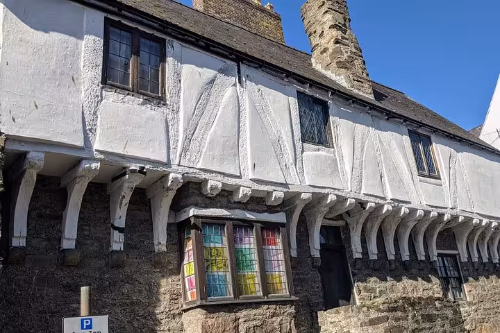 Traditional Welsh timber-framed house stop on Snowdonia & The 3 Castles Tour in North Wales historic town