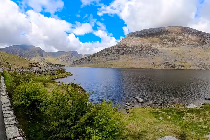 Mountain lake views in Snowdonia National Park on the Snowdonia & 3 Castles Tour, North Wales