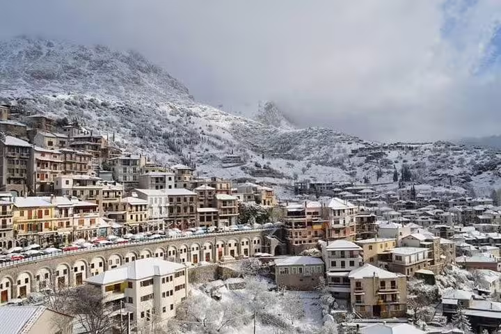 Snowy Arachova mountain village near Delphi, Greece, winter scenery on full-day Delphi Arachova Distomo tour