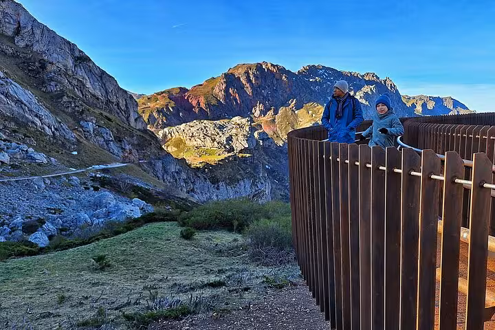 Tourists admire breathtaking landscapes and dramatic cliffs at Somiedo Natural Park during an Oviedo guided tour.