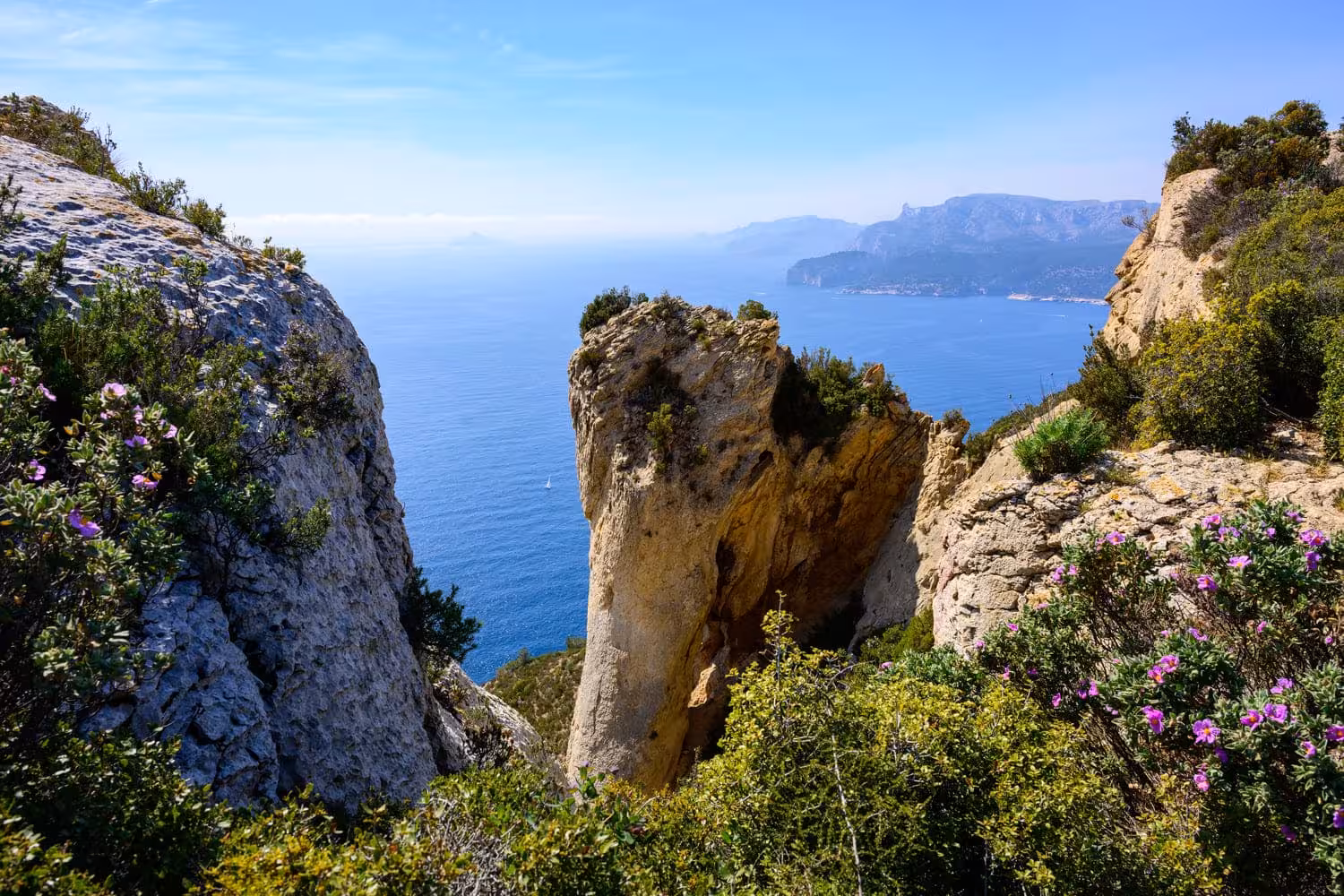 Limestone rock viewpoint over the Mediterranean near Sormiou, Calanques National Park coastal escape hike