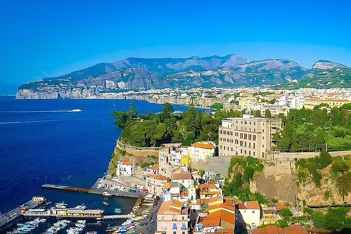 Panoramic view of Sorrento cliffs, marina and Bay of Naples on a guided Amalfi Coast private shore excursion
