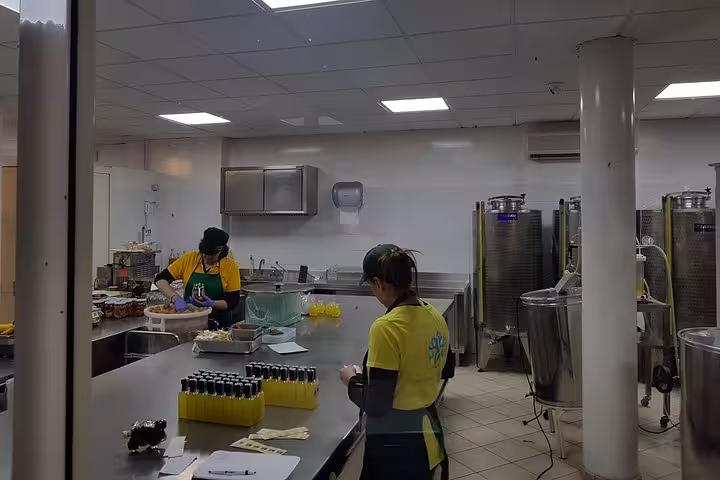 Behind-the-scenes limoncello bottling in Sorrento on Amalfi Coast day trip from Rome with local tastings