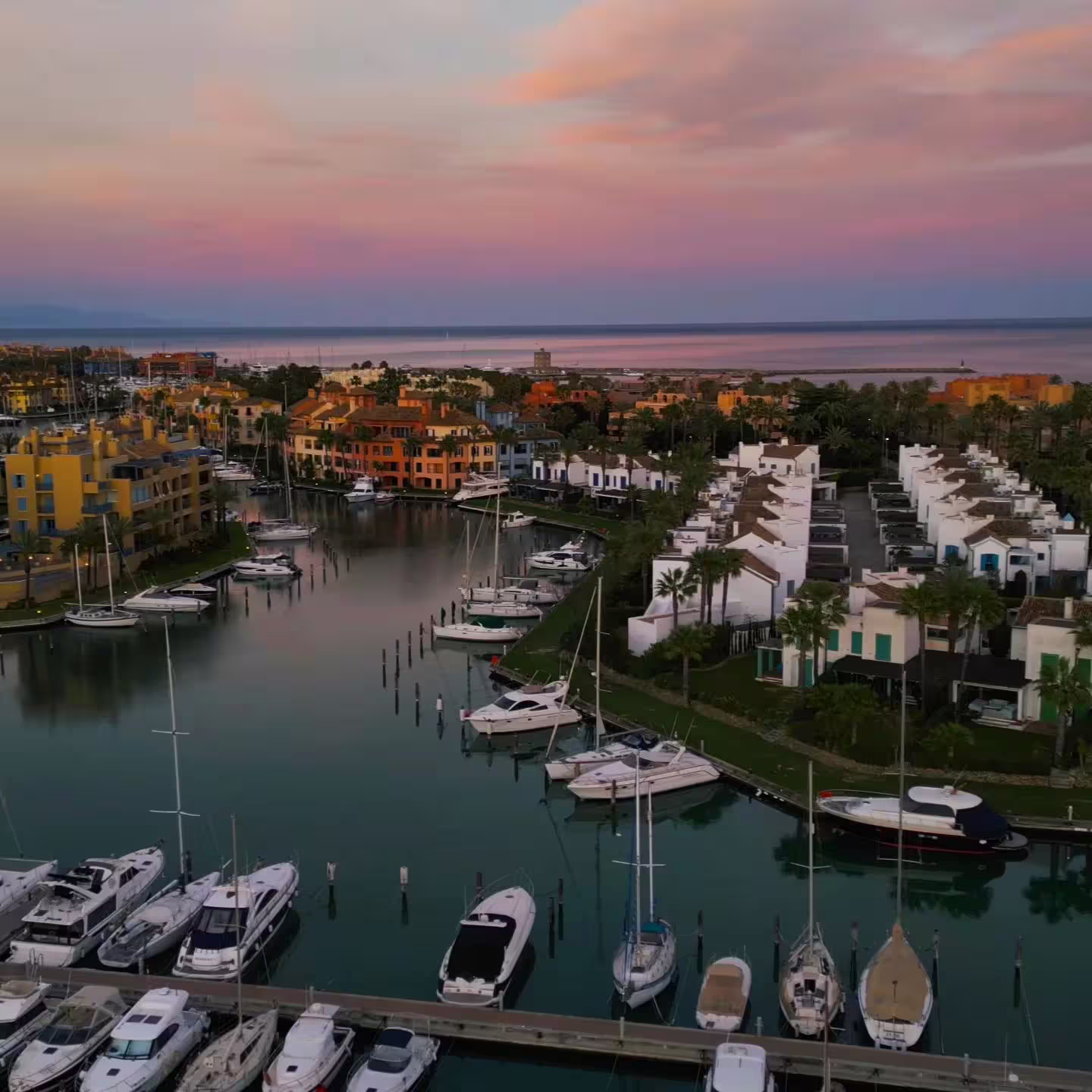 Walk the inner canal of the Sotogrande marina, surrounded by luxurious apartments and unique landscapes.