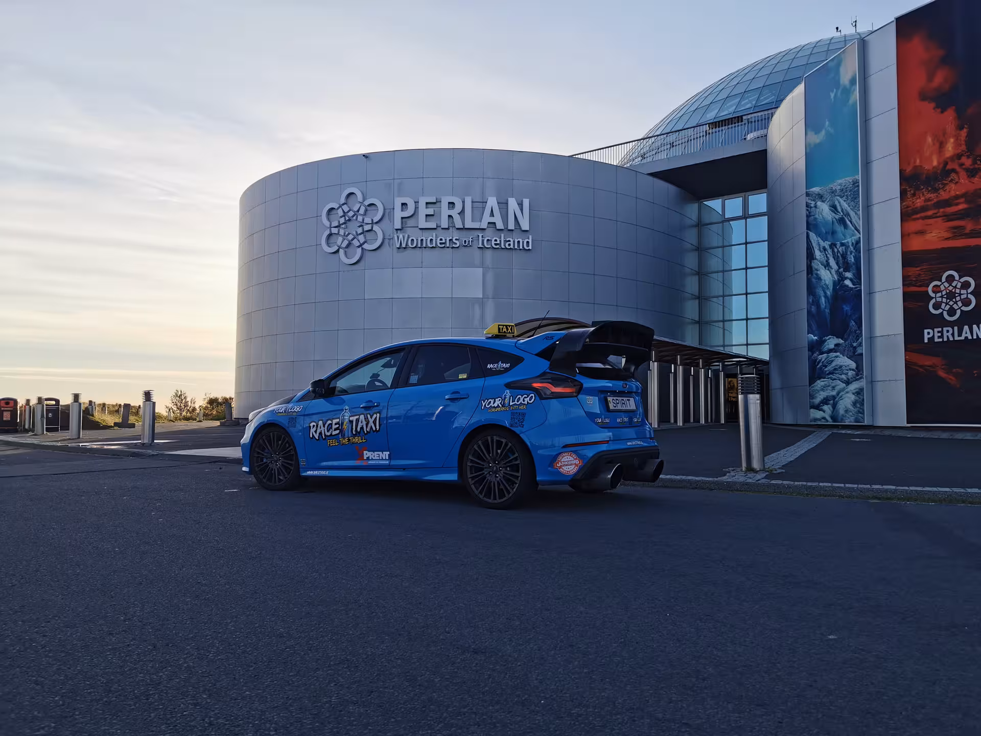 Race Taxi rally car parked at Perlan Reykjavik, start point for Iceland South Coast Adventure Rally Car Edition