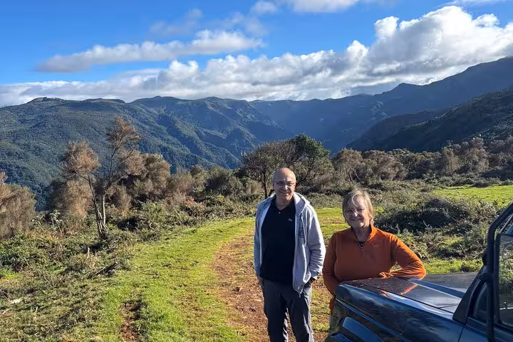 Guests at mountain viewpoint in southwest Madeira during cultural and geological 4x4 jeep tour