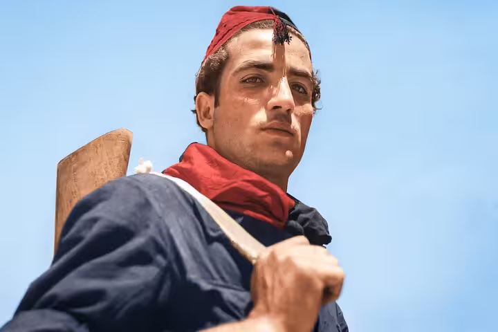 Spanish Civil War reenactor in traditional attire during Barcelona tour.