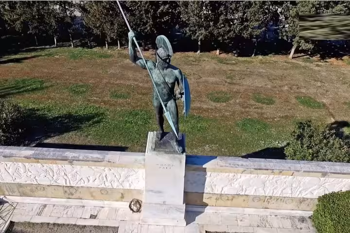 Bronze Spartan warrior statue at Thermopylae memorial stop on a luxury private tour from Athens