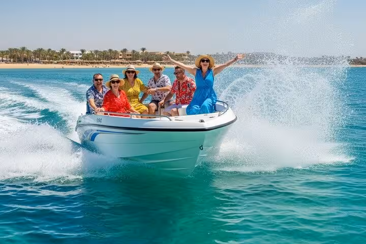 Group riding a speed boat in Sharm El Sheikh, Red Sea splash action on a 2-hour coastal tour