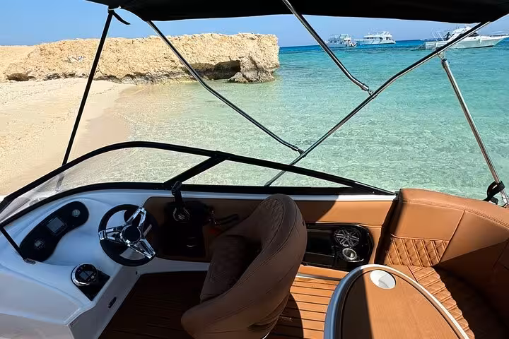 Speedboat cockpit view near Ozirea Island lagoon, part of Hurghada private speedboat trip with snorkeling