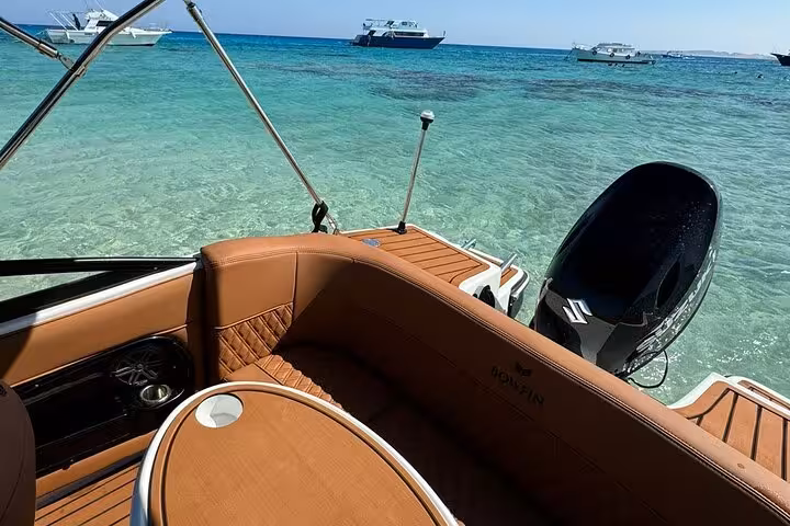 Speedboat deck view over turquoise Red Sea in Hurghada, private dolphin watching and snorkeling excursion